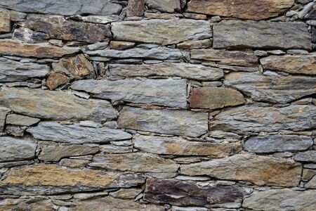 stone wall stones with irregular shapesの写真素材