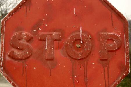 stop sign painted in redの写真素材