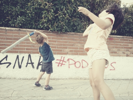 children playing in the streetの写真素材