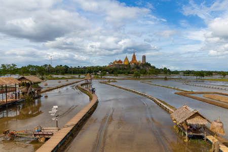 Temple on the top of the hill And a hut in the rice fields