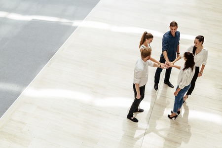 Business teamwork. People with joined handsの写真素材