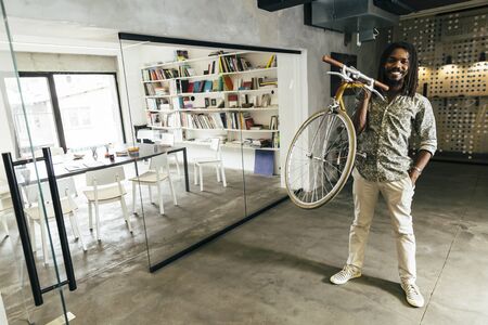 Businessman riding a bicycle to work