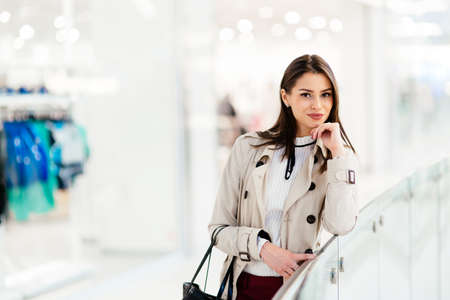 Beautiful well dressed businesswoman posingの写真素材