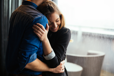 Truly happy couple in love hugging and smilingの写真素材
