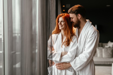 Beautiful couple enhoying wellness weekend in a luxurious resortの写真素材