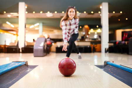 Beautiful woman enjoying  bowlingの写真素材