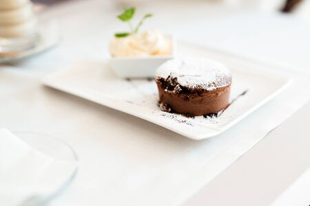 Beautiful souffle and vannila ice cream served in restaurantの写真素材