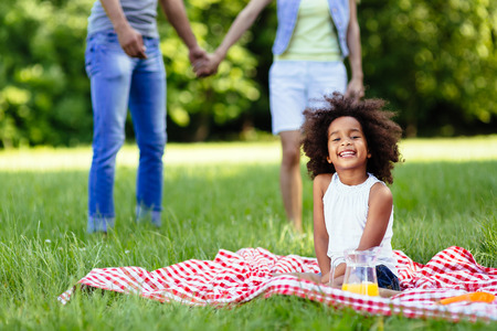 Child is happy when parents are in love and family bond is strongの写真素材