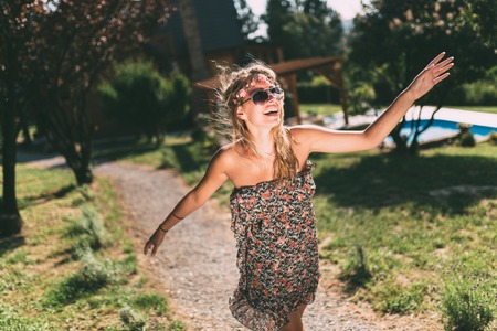 Beautiful hippie girl on vacation travelingの写真素材