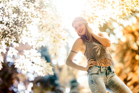Beautiful happy blonde posing in natureの写真素材