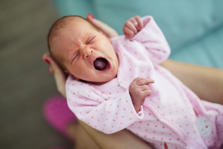 Screaming cute babies and restless nights are inevitableの写真素材