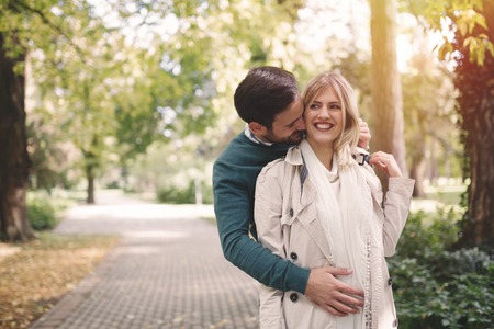 Loving happy couple walking in park