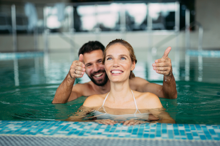 Beautiful couple enjoying spa wellness weekendの写真素材