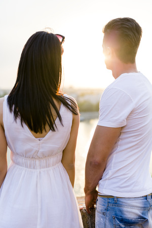 Happy couple in love smiling and being sensualの写真素材