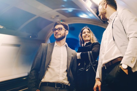 Busy business colleagues in subway station undergroundの写真素材