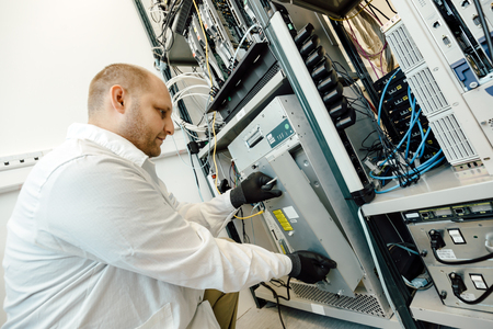 Technician working in network card labaratory
