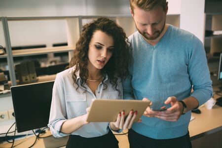 Business colleagues having meeting in conference room in modern officeの写真素材