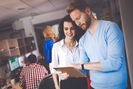 Business colleagues having meeting in conference room in modern officeの写真素材