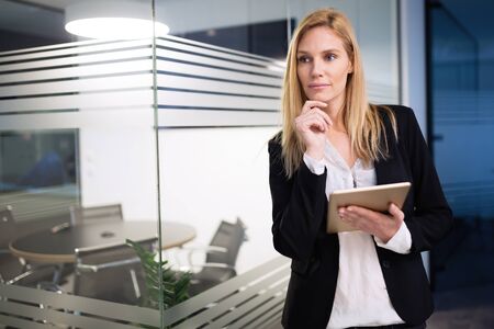 Businesswoman working in information technology company officeの写真素材