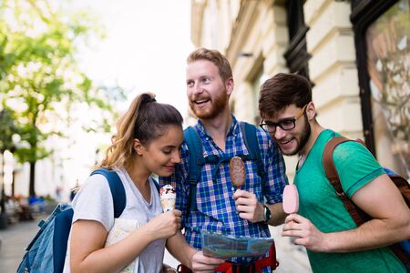 Happy tourists traveling and sightseeing cityの写真素材