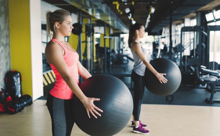 Athletic woman during aerobics training in gymの写真素材