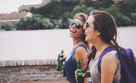 Party girls enjoying summer freedom and festival funの写真素材