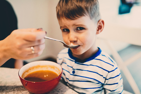 Children have to learn to eat independantly aloneの写真素材