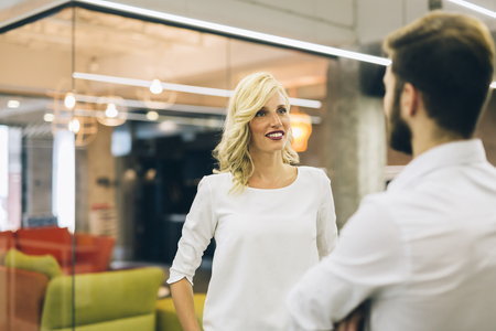 Saleswoman talkining to customerの写真素材