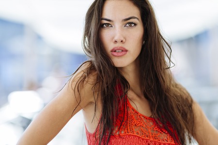 Beautiful woman posing outdoorの写真素材