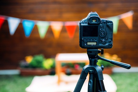 Picture of digital camera placed on tripod