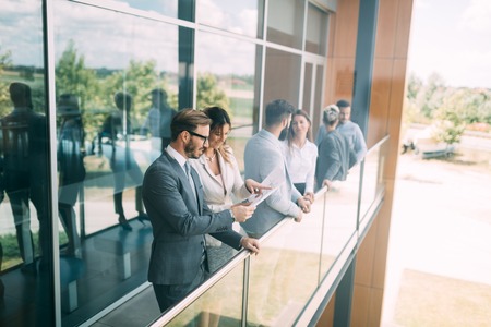 Young designers talking on break about business plansの写真素材