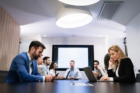 Picture of businesspeople having meeting in conference room