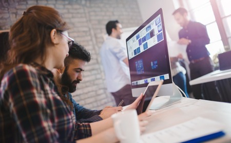 Creative coworkers working in officeの写真素材