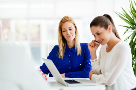 Business people using devicesの写真素材