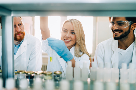 Group of chemistry students working in laboratoryの写真素材
