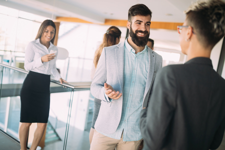 Young designers talking on break about business plansの写真素材