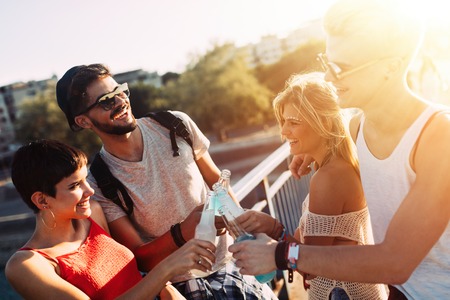 Group of young happy friends having fun time