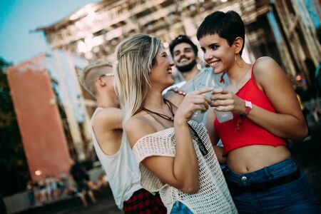 Group of friends having great time on music festivalの写真素材