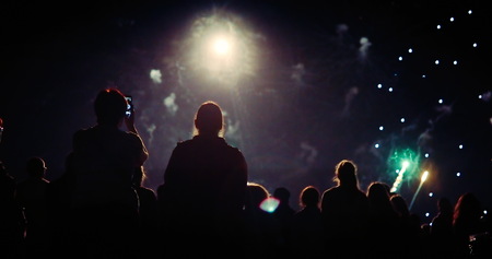 Crowd watching fireworksの写真素材