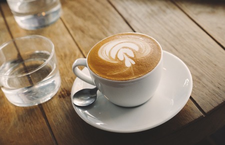Closeup of barista made coffee with froth artの写真素材