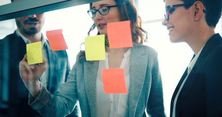 Group of business people collaborating in business office