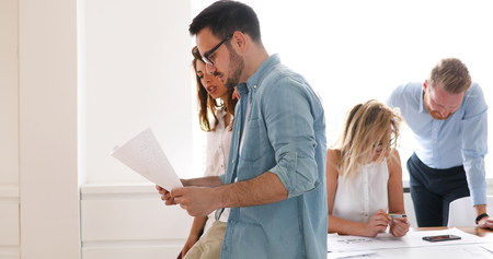 Picture of young architects discussing about projectの写真素材