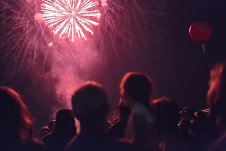 Crowd watching fireworksの写真素材