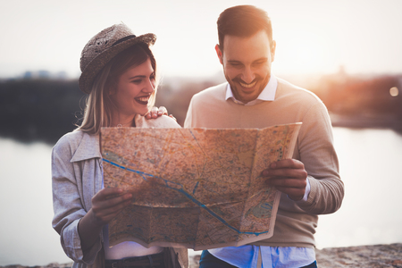 Happy tourists traveling and smilingの写真素材