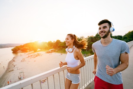 Couple jogging outdoors