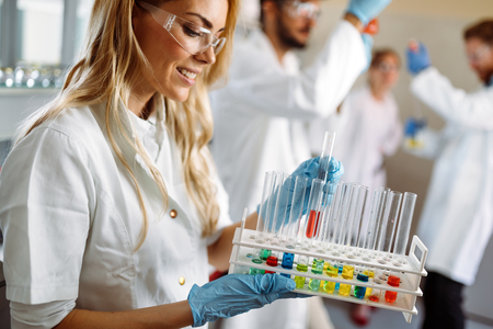 Attractive student of chemistry working in laboratoryの写真素材