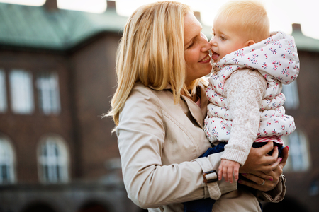 Happy family moments of mom and toddler. Childhood and motherhood care.の写真素材
