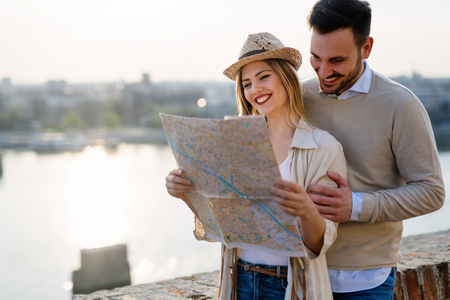 Tourist couple exploring cityの写真素材