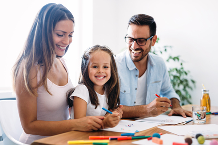 Happy familiy spending fun time at homeの写真素材