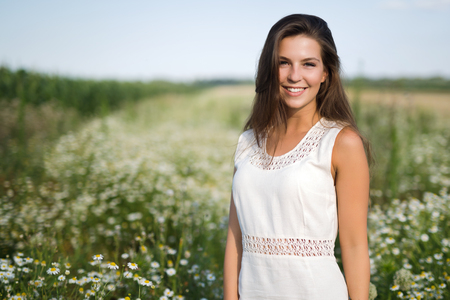 Young beautiful woman spending time in natureの写真素材